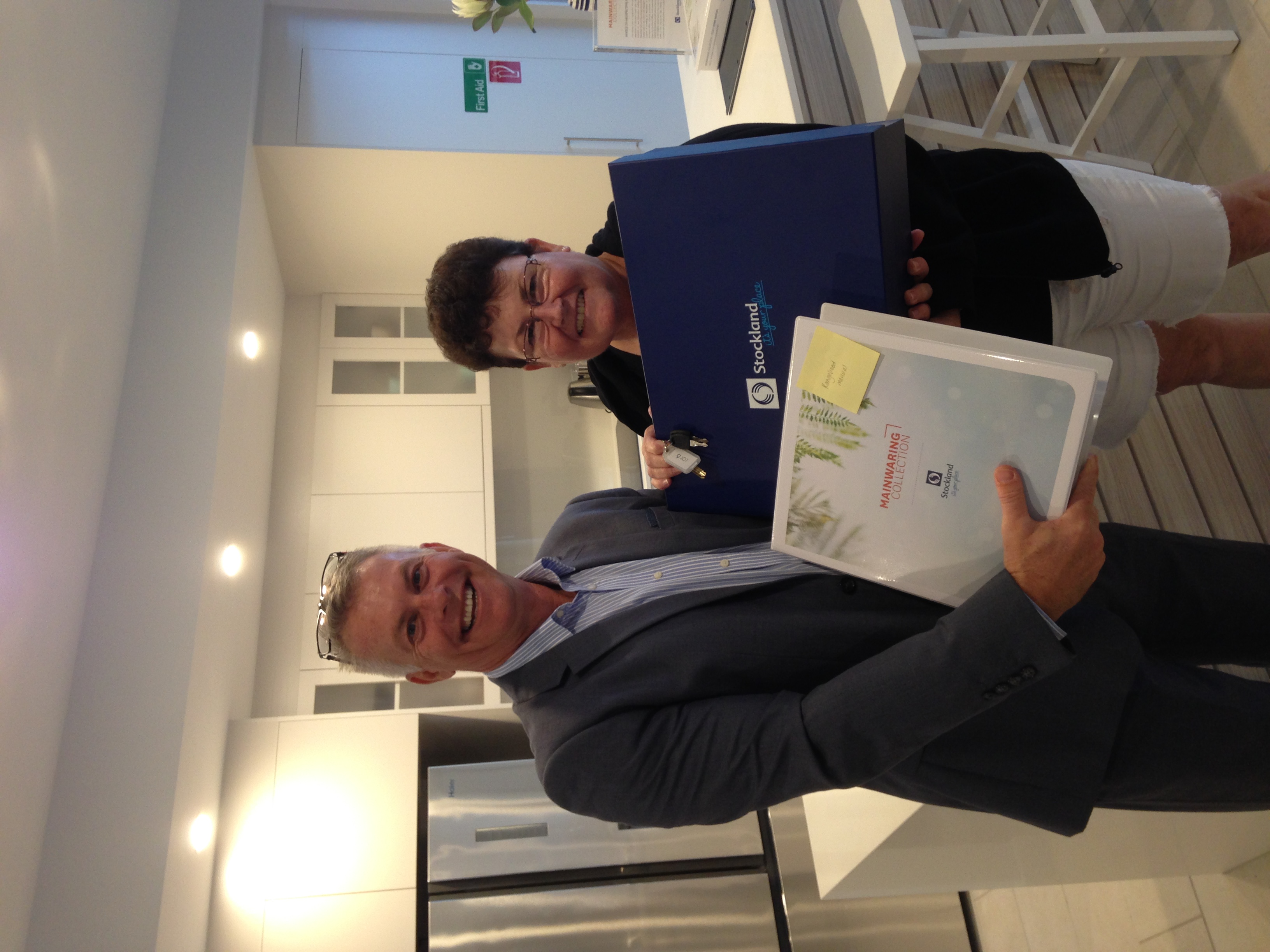 Client at settlement of their new investment property