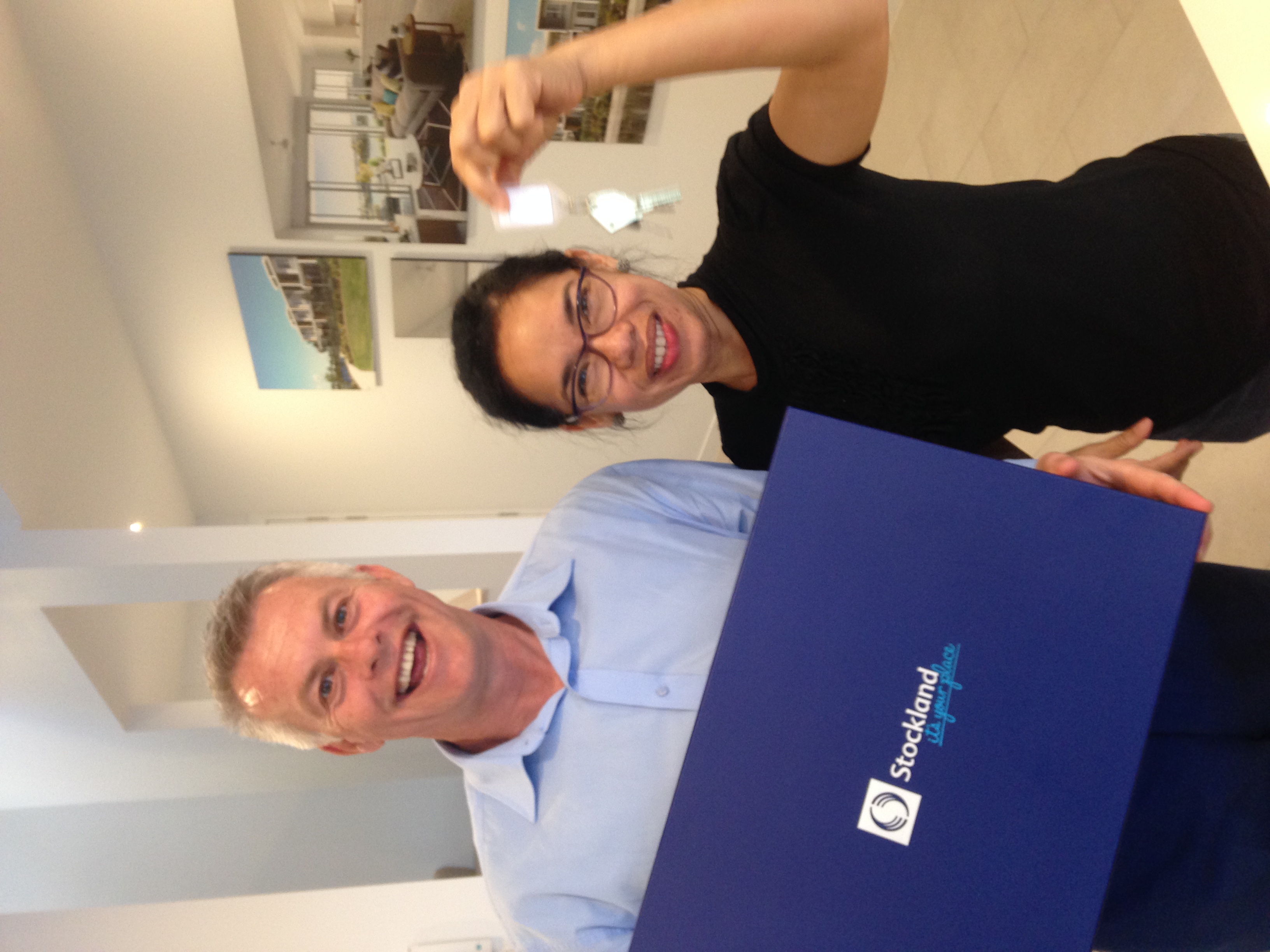 Client in front of their new build investment home